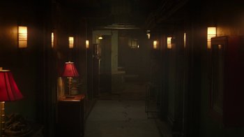 Movie still from “Hotel Artemis” (2018), directed by Drew Pearce – A hallway with a red lamp on the wall; Extreme Wide shot, High angle