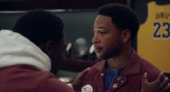 Movie still from “House Party” (2023), directed by Calmatic – A man with his hand on his shoulder talking to another man; Close Up shot, Over the shoulder angle