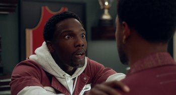 Movie still from “House Party” (2023), directed by Calmatic – Two men are talking to each other in a room; Close Up shot, Over the shoulder angle