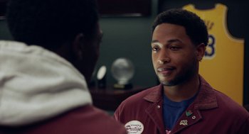 Movie still from “House Party” (2023), directed by Calmatic – Two men talking to each other in front of a mirror; Close Up shot, Over the shoulder angle