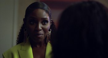 Movie still from “House Party” (2023), directed by Calmatic – A person looking at a mirror; Close Up shot, Over the shoulder angle