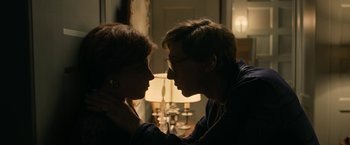 Movie still from “House of Gucci” (2021), directed by Ridley Scott – A man and a woman are looking into each others eyes; Close Up shot, Over the shoulder angle
