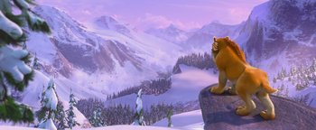 Movie still from “Ice Age: Continental Drift” (2012), directed by Michael Thurmeier – A bear sitting on top of a rock on top of a mountain; Wide shot, Low angle