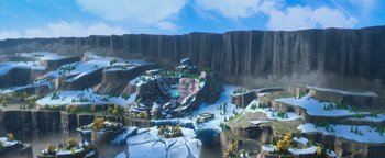 Movie still from “Ice Age: Continental Drift” (2012), directed by Michael Thurmeier – An image of an animated scene with a mountain in the background; Extreme Wide shot, High angle
