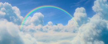 Movie still from “Ice Age: Continental Drift” (2012), directed by Michael Thurmeier – A plane flying in the sky with a rainbow in the background; Extreme Wide shot, Low angle