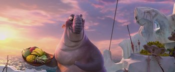 Movie still from “Ice Age: Continental Drift” (2012), directed by Michael Thurmeier – An animated walrus standing on top of an ice floe in the ocean; Medium shot, Low angle