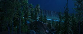 Movie still from “Ice Age: Continental Drift” (2012), directed by Michael Thurmeier – A night scene of trees and a waterfall in the background; Extreme Wide shot, High angle
