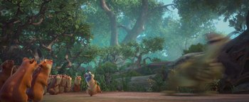 Movie still from “Ice Age: Continental Drift” (2012), directed by Michael Thurmeier – A couple of bears sitting in the middle of a forest; Wide shot, Low angle