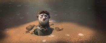 Movie still from “Ice Age: Continental Drift” (2012), directed by Michael Thurmeier – An animated animal is sitting in a hole; Medium shot, High angle