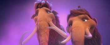Movie still from “Ice Age: Continental Drift” (2012), directed by Michael Thurmeier – A couple of animals that are standing in a room; Close Up shot, Low angle