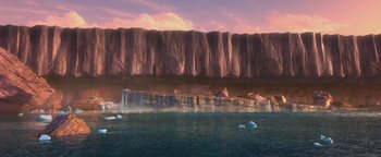 Movie still from “Ice Age: Continental Drift” (2012), directed by Michael Thurmeier – An image of an ocean with a waterfall in the background; Extreme Wide shot, Low angle