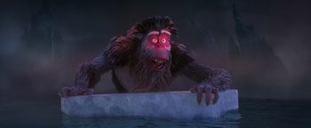 Movie still from “Ice Age: Continental Drift” (2012), directed by Michael Thurmeier – An animated monkey is holding on to the edge of the water; Medium shot, Low angle