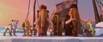 Movie still from “Ice Age: Continental Drift” (2012), directed by Michael Thurmeier – A group of ice age animals standing next to each other; Wide shot, Low angle