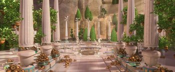 Movie still from “Ice Age: Continental Drift” (2012), directed by Michael Thurmeier – A table set up for a formal dinner with trees; Extreme Wide shot, High angle