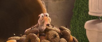 Movie still from “Ice Age: Continental Drift” (2012), directed by Michael Thurmeier – An ice age character is surrounded by acorns; Close Up shot, High angle