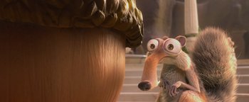 Movie still from “Ice Age: Continental Drift” (2012), directed by Michael Thurmeier – An ice age scene with an ice age character looking surprised; Close Up shot, Over the shoulder angle