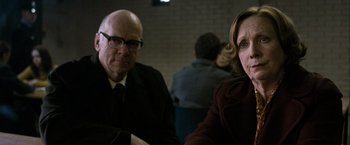 Movie still from “Hunger” (2008), directed by Steve McQueen – A man and a woman sitting next to each other; Close Up shot, Over the shoulder angle
