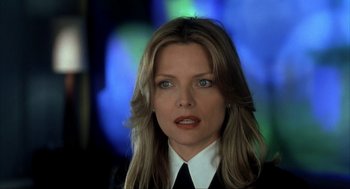 Movie still from “I Am Sam” (2001), directed by Jessie Nelson – A person wearing a suit and tie; Close Up shot, Low angle