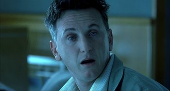 Movie still from “I Am Sam” (2001), directed by Jessie Nelson – A person wearing a suit and tie; Close Up shot, High angle