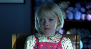 Movie still from “I Am Sam” (2001), directed by Jessie Nelson – A little girl sitting in front of a stuffed animal; Close Up shot, Over the shoulder angle