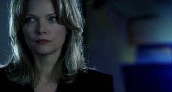 Movie still from “I Am Sam” (2001), directed by Jessie Nelson – A person with long hair; Close Up shot, Over the shoulder angle