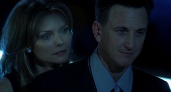 Movie still from “I Am Sam” (2001), directed by Jessie Nelson – A man and a woman standing next to each other; Close Up shot, Low angle