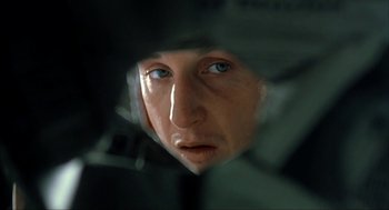 Movie still from “I Am Sam” (2001), directed by Jessie Nelson – A man with blue eyes looking into a mirror; Extreme Close Up shot, Over the shoulder angle