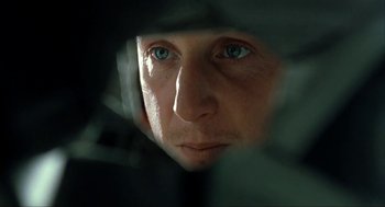 Movie still from “I Am Sam” (2001), directed by Jessie Nelson – A person's face looking through a window; Extreme Close Up shot, Over the shoulder angle