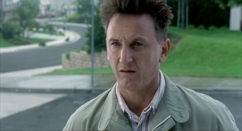 Movie still from “I Am Sam” (2001), directed by Jessie Nelson – A person wearing a jacket; Close Up shot, High angle