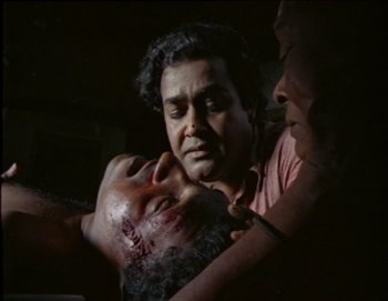 Movie still from “Iruvar” (1997), directed by Mani Ratnam – Close Up shot, Low angle
