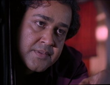 Movie still from “Iruvar” (1997), directed by Mani Ratnam – Close Up shot, Low angle