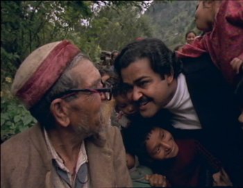 Movie still from “Iruvar” (1997), directed by Mani Ratnam – Medium shot, High angle