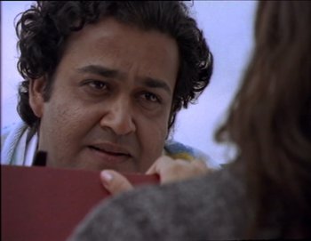 Movie still from “Iruvar” (1997), directed by Mani Ratnam – Close Up shot, Low angle