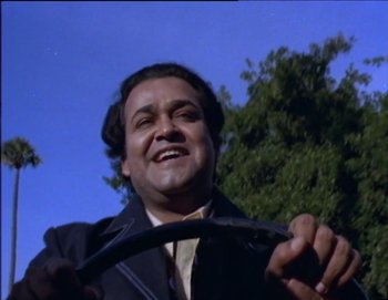 Movie still from “Iruvar” (1997), directed by Mani Ratnam – Close Up shot, Low angle