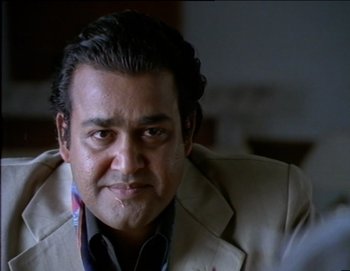 Movie still from “Iruvar” (1997), directed by Mani Ratnam – Close Up shot, Low angle
