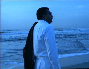 Movie still from “Iruvar” (1997), directed by Mani Ratnam – Medium shot, Low angle
