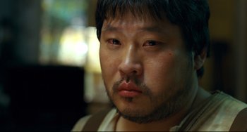 Movie still from “I Saw the Devil” (2010), directed by Jee-woon Kim – A person with a beard; Close Up shot, Low angle