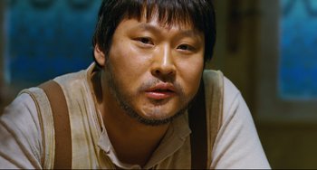 Movie still from “I Saw the Devil” (2010), directed by Jee-woon Kim – A person with a beard; Close Up shot, Low angle