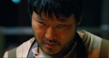 Movie still from “I Saw the Devil” (2010), directed by Jee-woon Kim – A person with a beard; Close Up shot, Low angle