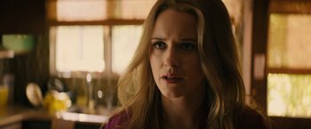 Movie still from “I'm Your Woman” (2020), directed by Julia Hart – A person with long blonde hair; Close Up shot, Over the shoulder angle