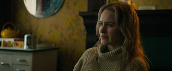 Movie still from “I'm Your Woman” (2020), directed by Julia Hart – A woman in a sweater looking at the camera; Close Up shot, Over the shoulder angle