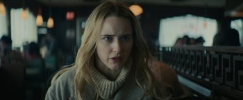 Movie still from “I'm Your Woman” (2020), directed by Julia Hart – A person with long hair; Close Up shot, Over the shoulder angle