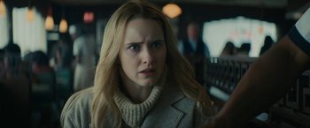 Movie still from “I'm Your Woman” (2020), directed by Julia Hart – A person wearing a jacket; Close Up shot, Over the shoulder angle