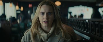 Movie still from “I'm Your Woman” (2020), directed by Julia Hart – A person with long blonde hair; Close Up shot, Over the shoulder angle