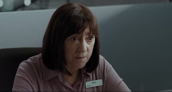 Movie still from “I, Daniel Blake” (2016), directed by Ken Loach – A woman sitting in front of a computer monitor; Close Up shot, Over the shoulder angle