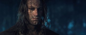 Movie still from “I, Frankenstein” (2014), directed by Stuart Beattie – A person with long brown hair; Close Up shot, Low angle
