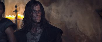 Movie still from “I, Frankenstein” (2014), directed by Stuart Beattie – A person with long black hair; Close Up shot, Low angle