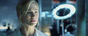 Movie still from “I, Frankenstein” (2014), directed by Stuart Beattie – A beautiful blonde woman with a white shirt; Close Up shot, Over the shoulder angle
