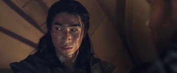 Movie still from “I, Frankenstein” (2014), directed by Stuart Beattie – A person with long black hair; Close Up shot, Low angle