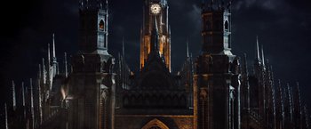 Movie still from “I, Frankenstein” (2014), directed by Stuart Beattie – A large cathedral with a clock on the top of the tower; Extreme Wide shot, Low angle